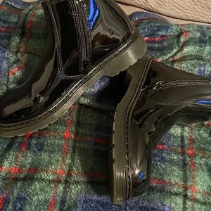 Black patent leather ankle boots with inside zipper